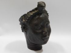 A Benin Bronze bust of woman, 8.5in tall