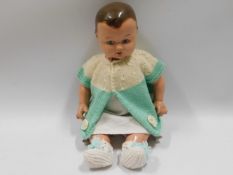 A composite head doll, 14.5in tall