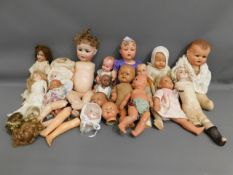 A quantity of mixed dolls & doll parts a/f includi