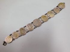 An early 20thC. Russian silver coin bracelet, 23.6