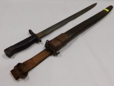 A 1913 British pattern Remington bayonet & scabbar