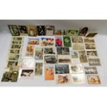 In excess of 300 postcards including local interes