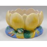 A Clarice Cliff pottery lily pad, 9in wide x 4.75i