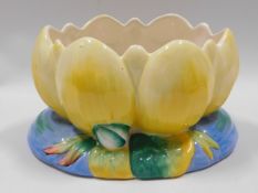 A Clarice Cliff pottery lily pad, 9in wide x 4.75i