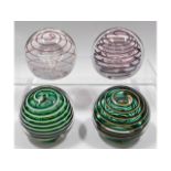 Four Liskeard glass paperweights, one dated 1977