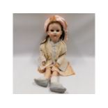 An Armand Marseille porcelain headed doll, 26in ta