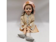 An Armand Marseille porcelain headed doll, 26in ta