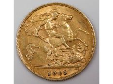 A George V 1913 UK half gold sovereign