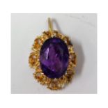 A 9ct gold mounted amethyst, 25mm drop, 3.2g