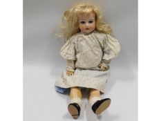 An Armand Marseille porcelain headed doll, 17in ta