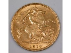 A George V 1913 UK half gold sovereign