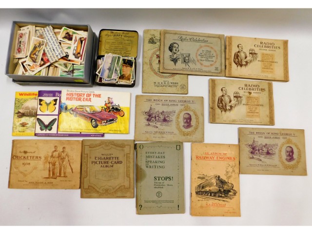 A quantity of tea & cigarette cards including thre