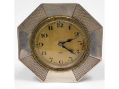 A silver cased bedside clock, Swiss eight day move