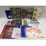A quantity of mint stamp collectors packs & Royal