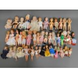 A quantity of 44 mixed dolls including Playmates &