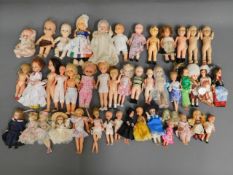 A quantity of 44 mixed dolls including Playmates &