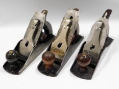 Three no. 4 1/2 smoothing planes, two Stanley Bail