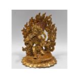 An ormolu style gilded figure of Tibetan God of Ra