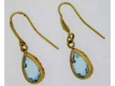 A pair of yellow metal earrings, electronically te
