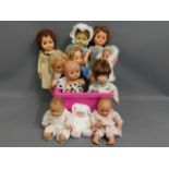 A quantity of 11 mixed dolls including Anne Geddes