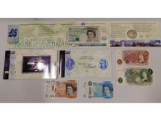 A Royal Mint issued £5 note & coin set, a current