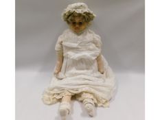 An antique wax head doll, 30in tall