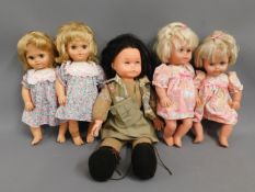 Two sets of twins & one other doll
