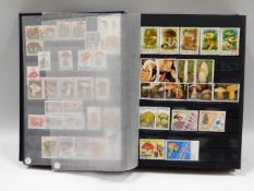 A stamp album of used & mint stamps relating to Na