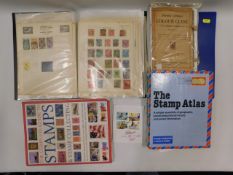 A stamp album twinned with stamp & postage ephemer