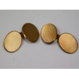 A pair of 9ct gold cuff links, 9.9g