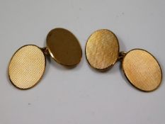 A pair of 9ct gold cuff links, 9.9g