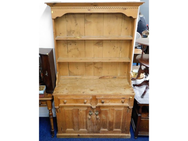 An antique pine farmhouse kitchen dresser, 78in hi