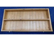 A heavy pine wall unit with shelf, 53in wide x 6in