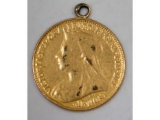 A mounted 1901 late Victorian half gold sovereign,