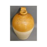 A stoneware flagon - 15.5in tall - T.T. Golding Ho