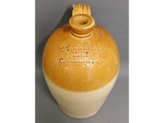 A stoneware flagon - 15.5in tall - T.T. Golding Ho