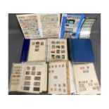 Three stamp albums including stamps from France, S