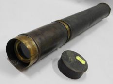 A brass telescope, measures 21in long not extended
