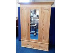 A Victorian three piece pitch pine wardrobe, 54.5i