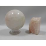A large polished rose quartz sphere 5.5in diameter