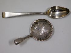 An 1864 Birmingham silver caddy spoon by Hilliard