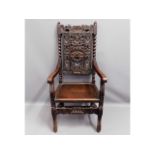 A 19thC. throne style chair with carved crown & te