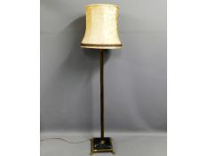 A brass standard lamp with green marble insert in