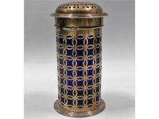 A 1904 Chester silver sifter with blue glass liner