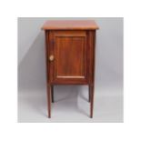 A Edwardian mahogany pot cupboard with boxwood inl