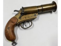 A brass Webley & Scott Ltd. London & Birmingham flare pistol