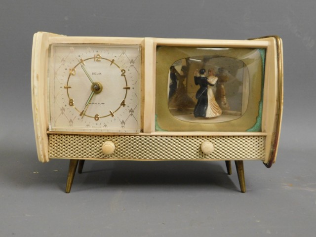 A mid 20thC. novelty clock & one other