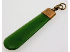 A 9ct gold mounted jade pendant, 56mm long, 4.4g