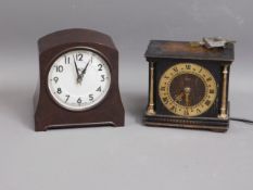 A Smiths bakelite electric clock, lacking lead & o