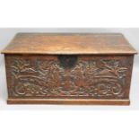 An 18thC. carved oak box with phoenix decor, 30.5i